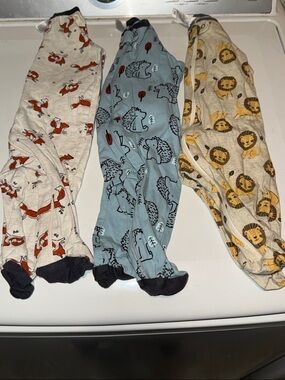 Gerber Kids Footed One-Pieces in Blue, Cream, and Tan Animal Prints